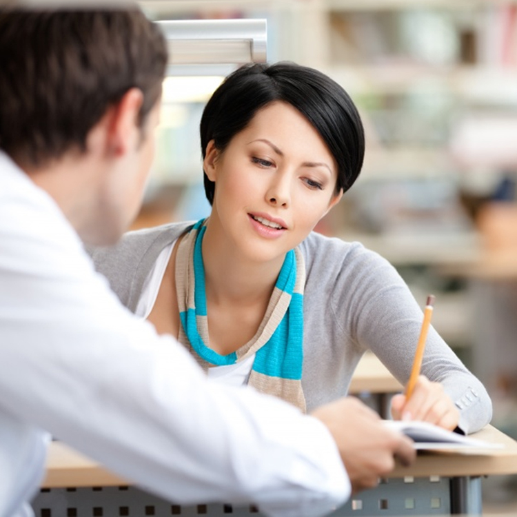 Young female meeting with male collegue